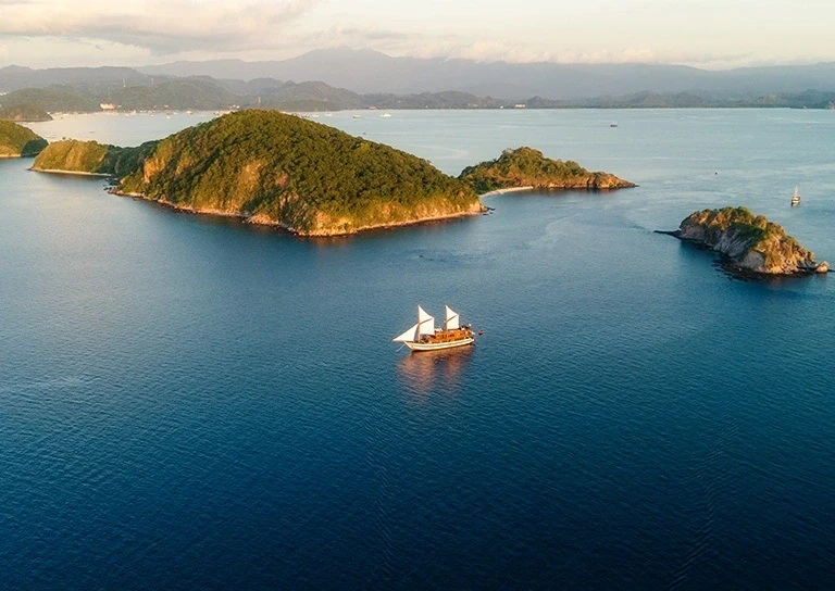 Neptune Cruise Phinisi at anchor in Komodo National Park